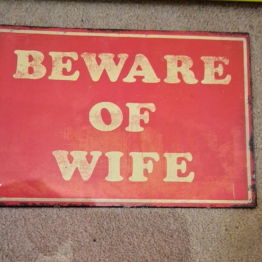 Red 'Beware of Wife' Sign